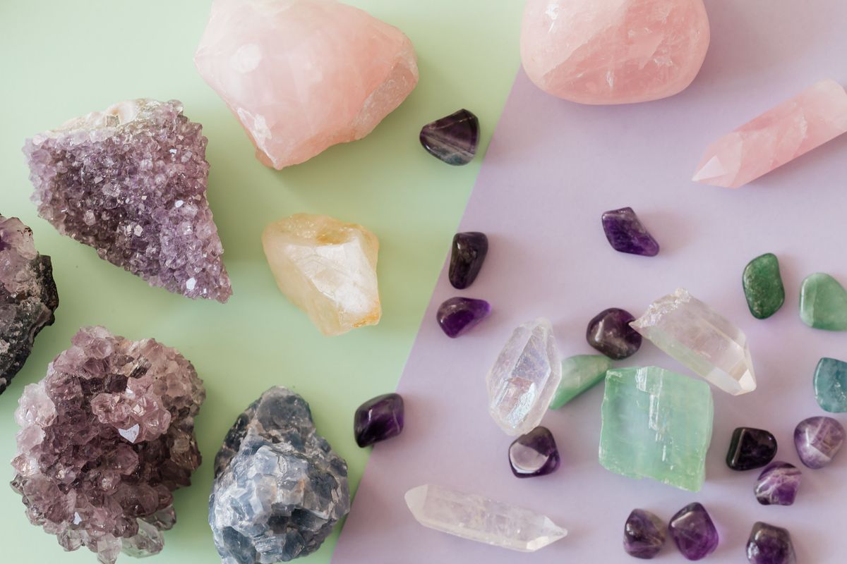 An array of healing crystals including amethyst, rose quartz and citrine